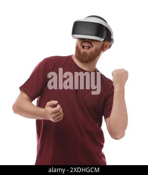 Emotional man using virtual reality headset on white background Stock Photo