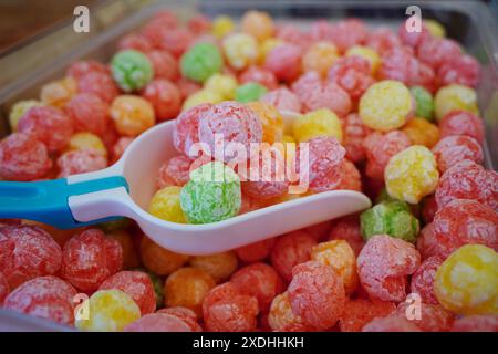 Colorful puffed rice balls for sale at market Stock Photo