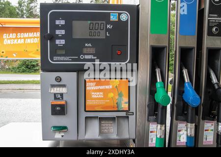 Filling a car at an unleaded petrol pump Stock Photo