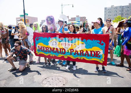 Participants of the 42nd Annual Mermaid Parade gathered at Coney Island in New York, NY on June 22, 2024. Since 1983, hundreds of thousands of New Yorkers and visitors have come to participate in and watch this parade, inspired by Coney Island Mardi Gras parades of the past. Similar to past years, this year featured a wide range of festive costumes, makeup, floats, banners, music, and more. (Photo by Hailstorm Visuals/Sipa USA) Stock Photo