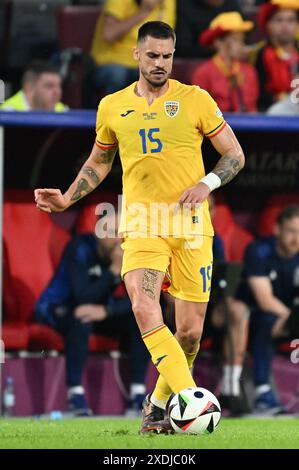 Andrei Burca (15) of Romania pictured during a soccer game between the national teams of Belgium, called the Red Devils and Romania on the second matchday in Group E  in the group stage of the UEFA Euro 2024 tournament , on Saturday 22 June 2024  in Cologne , Germany . PHOTO SPORTPIX | David Catry Stock Photo
