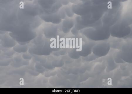 Mammatus clouds in the sky Stock Photo