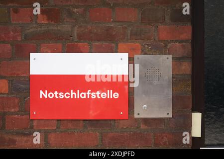 Overnight accommodation, Notschlafstelle for homeless people in the city center of Cologne in Germany. Translation: emergency shelter Stock Photo