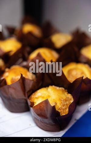 freshly baked muffins on a metal tray. Top view Stock Photo