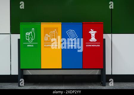 Selective recycling bins in metro station in Bucharest (glass, plastic-metal, paper, biodegradable waste) Stock Photo