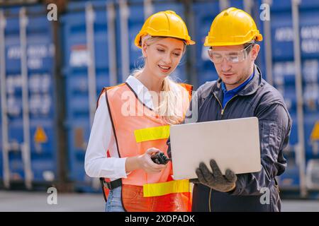 Group of Port Container Ship Yard Colleague Workers working together join teamwork control operate solving problem. Stock Photo