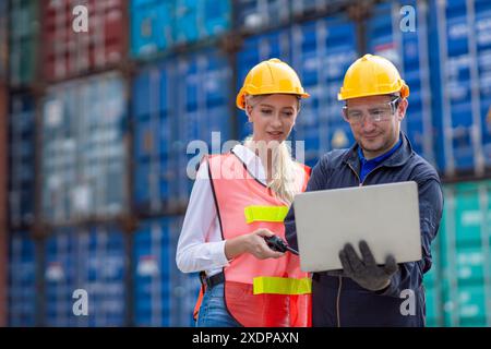 Group of Port Container Ship Yard Colleague Workers working together join teamwork control operate solving problem. Stock Photo