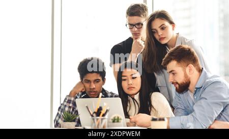 Students learning session with devices in library Stock Photo