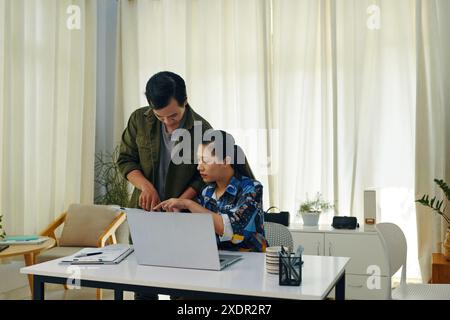 Colleagues Working In Team At Office Stock Photo