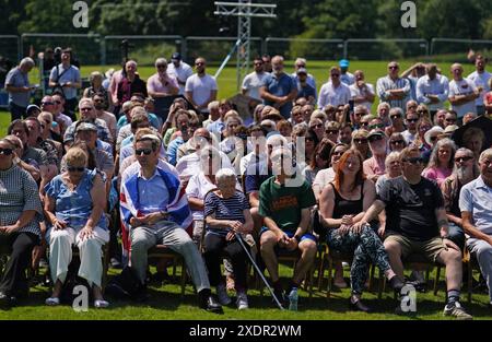 People wait for a speech by Reform UK leader Nigel Farage at the Mercure Maidstone Great Danes Hotel in Maidstone Kent. Picture date: Monday June 24, 2024. Stock Photo