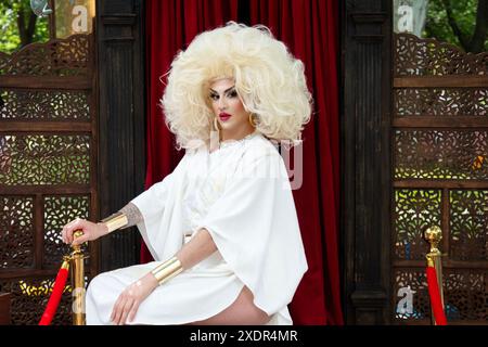A tall slender drag performance artist poses for photos in Washington ...
