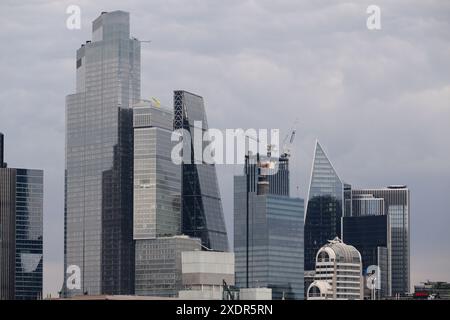 A view across the Thames of the tower blocks the City of London’s financial district. City of London, London, UK.  12 Jun 2024 Stock Photo