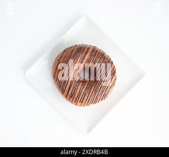 Chocolate Doughnuts Isolated, Brown Donuts with White Stripes, Cocoa Doughnuts on White Background Stock Photo