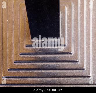 A metal stand in the form of steps Stock Photo