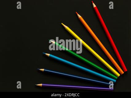 Bright school supplies on plain background. Assortment of colorful stationery, pencil, set of colored pencils. Back to school concept, artist concept Stock Photo