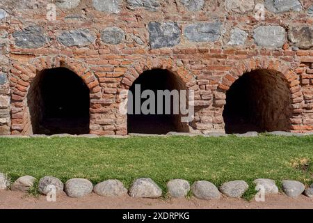 Entrance natural wine cellars in Cafayate, Argentina. Used for the storage of wine in bottles or barrels. Stock Photo