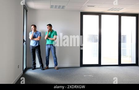 Executives. Empty office building. Stock Photo