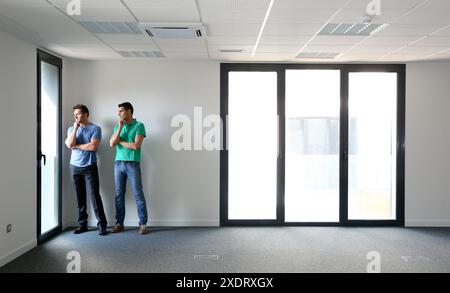 Executives. Empty office building. Stock Photo