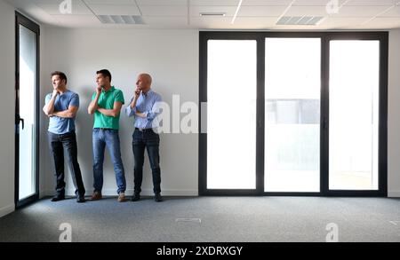 Executives. Empty office building. Stock Photo