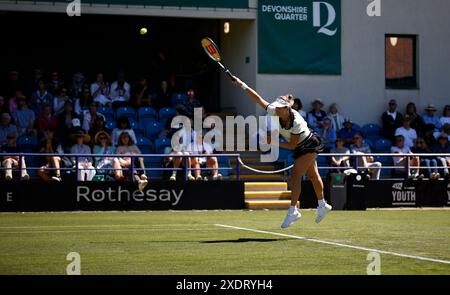 Eastbourne, East Sussex, UK. 24th June 2024; Devonshire Park, Eastbourne, East Sussex, England: Rothesay International Eastbourne, Day 1, Anastasia Pavlyuchenkova serves to Magda Linette (POL), womens singles match Credit: Action Plus Sports Images/Alamy Live News Stock Photo