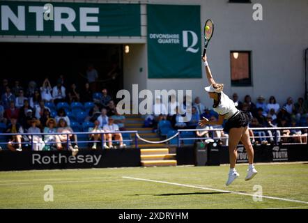 Eastbourne, East Sussex, UK. 24th June 2024; Devonshire Park, Eastbourne, East Sussex, England: Rothesay International Eastbourne, Day 1, Anastasia Pavlyuchenkova serves to Magda Linette (POL), womens singles match Credit: Action Plus Sports Images/Alamy Live News Stock Photo