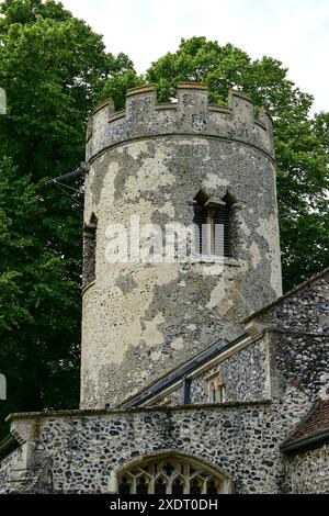 The round towered St Michael's Church, Aslacton, Norfolk, England, UK Stock Photo