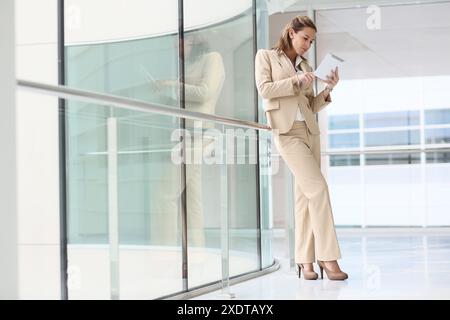 Businesswoman using digital tablet Stock Photo