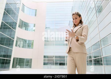 Businesswoman using digital tablet Stock Photo