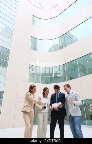 Businesspeople using digital tablet Stock Photo