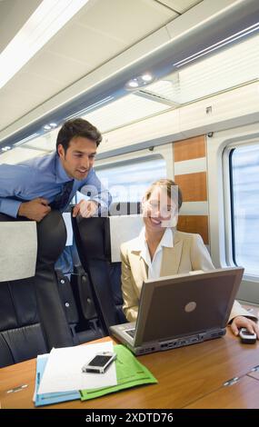 Businessmen working connected to the internet. Passenger. AVE, Tren de Alta Velocidad, Zaragoza, Aragón. Spain. Stock Photo