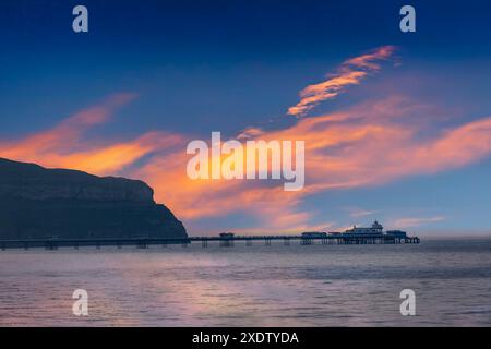 Llandudno pier at sunset Stock Photo - Alamy