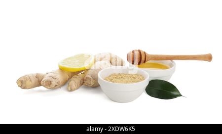Fresh ginger root and bowl with dried powder on white background Stock Photo