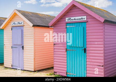 Colourful beach huts in Amble Northumberland Stock Photo