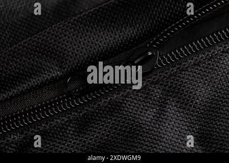 black water-proof fabric close-up, thick fabric with little water protection Stock Photo