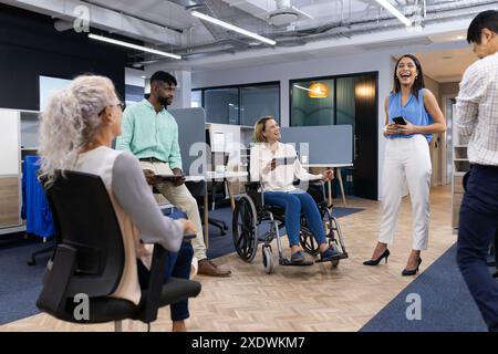 Group of business people in office having meeting, discussing ideas, smiling Stock Photo