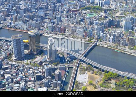 The most recognizable Asahi Group Holdings, Ltd. headquarters designed by Philippe Starck, Tokyo JP (aerial) Stock Photo