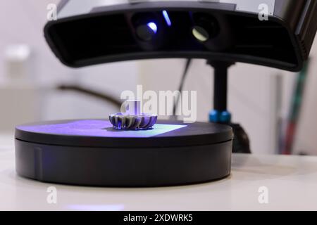 Industrial desktop 3D scanner with blue light LED projector for reverse engineering and inspection. Selective focus. Stock Photo