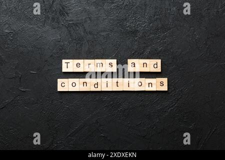 Terms and Conditions word written on wood block. Terms and Conditions text on table, concept. Stock Photo