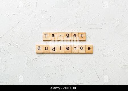 target audience word written on wood block. target audience text on table, concept. Stock Photo
