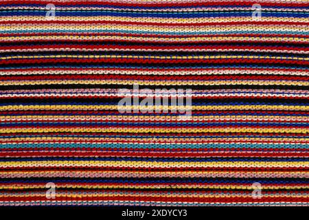 Piece of knitted blanket in various colors Stock Photo