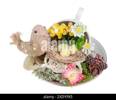 Easter handmade  nest from rope and clay cup  with funny  linen  bird and eggs   isolated Stock Photo