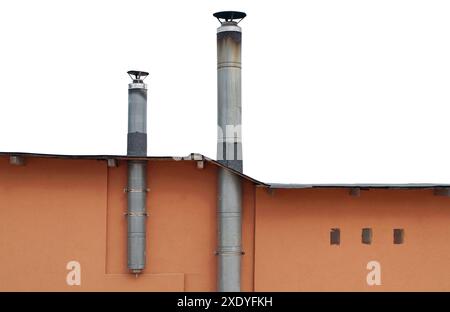 Roof line and tin vent pipes in a shelter for isolation from a pandemic isolated Stock Photo