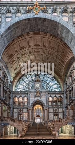 Old clock on the facade of the railway station in Antwerp Stock Photo