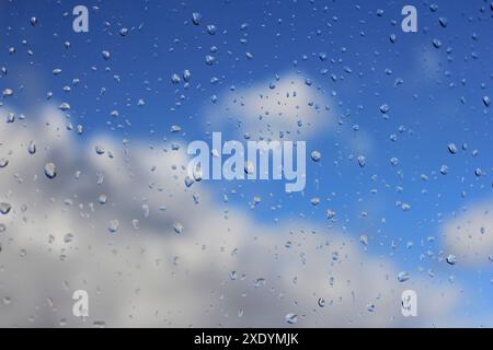 Raindrops on a window pane in fine weather, Germany Stock Photo