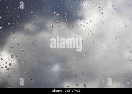 Raindrops on a window pane in rainy weather, Germany Stock Photo