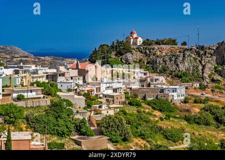 Village of Sellia, houses scattered around hills near Libyan Sea shore, haze in distance caused by Sahara dust, near Plakias, Central Crete, Greece Stock Photo