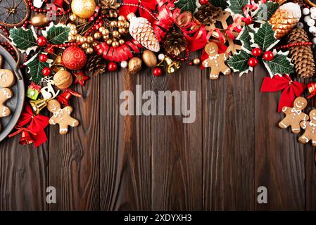 Christmas background of tray with gingerbread cookie men on wooden table Stock Photo
