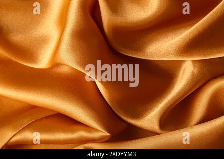 Texture of orange silk fabric Stock Photo