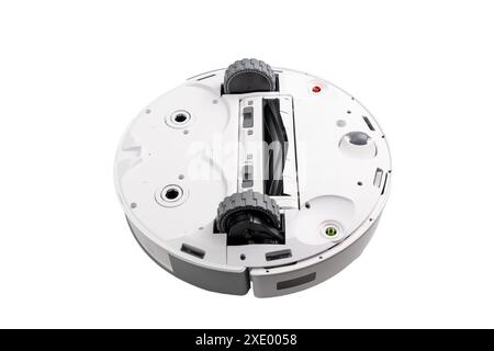 A white robot with black wheels is shown from the side. Robot vacuum cleaner on a white background. Stock Photo