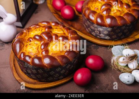 easter bread and eggs on wood Stock Photo